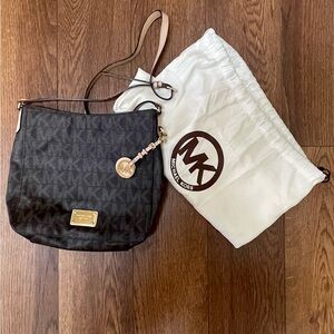 Michael Kors cross body with duster bag. Used- good condition